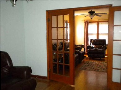 view of glass doors into living room