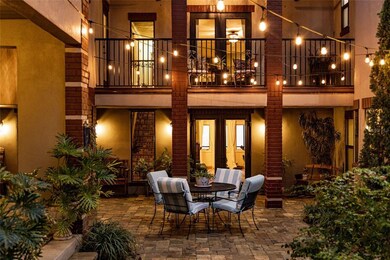 Front Courtyard with Beautiful French Doors to Hal
