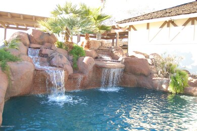 Beautiful waterfall in backyard oasis!