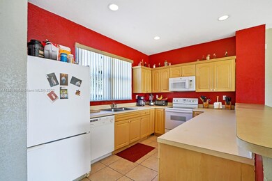 Kitchen with Wood Cabinets, all appliances stay