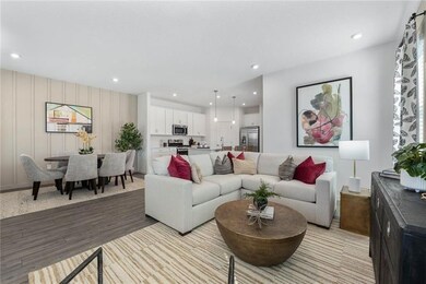Living room featuring recessed lighting and light wood-style flooring