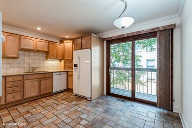 Eating area and balcony access.  Possibly a grilli