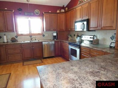 Beautiful cherry cabinetry and stainless steel app