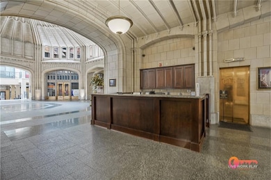 Reception with high vaulted ceiling and arched walkways