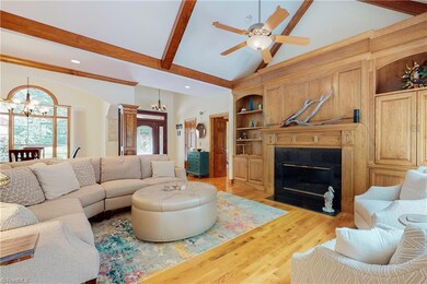 Great room with built ins and vaulted ceilings