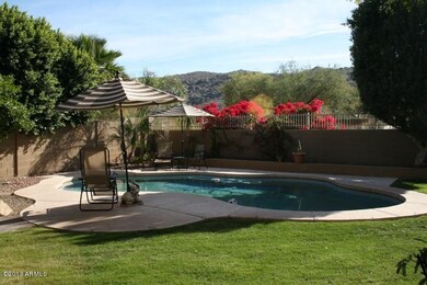 backyard pool and mountain views