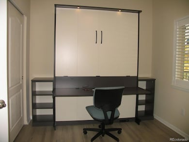 Murphy bed set in desk position.  Desk swings below bed for concurrent use.