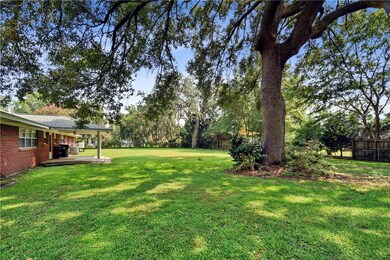 Huge rear yard w/oaks