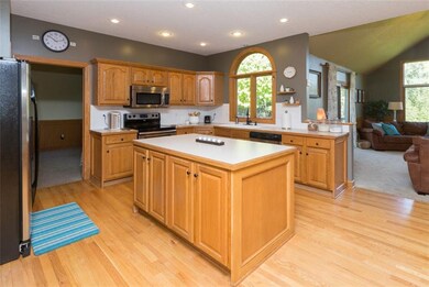 Big kitchen. (Doorway under the clock goes to offi