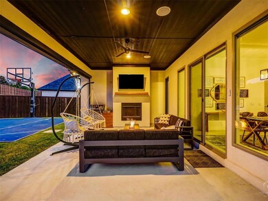 Covered entertaining area with Outdoor Fireplace.