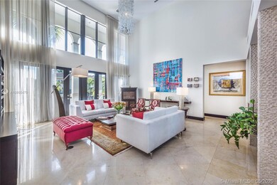 Formal living area features double-heighted ceilings