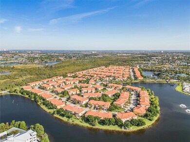 Bird's eye view featuring a water view and a resid
