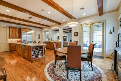 The bright and inviting breakfast room opens to a