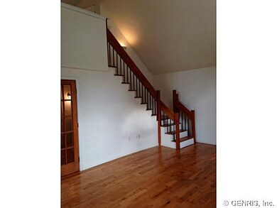 Living Room. Glistening hardwood floors, french do