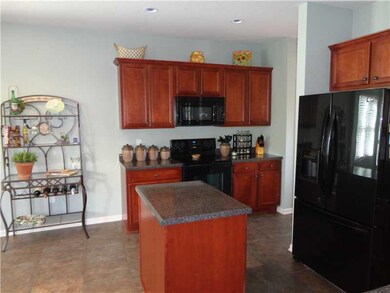 Kitchen. Recessed lighting allows brightness witho