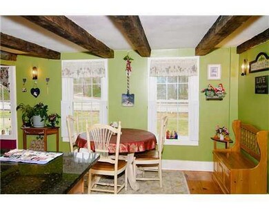 Kitchen. Eat in area in front of the...