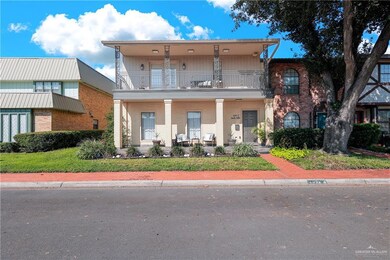 View of front of home with a balcony