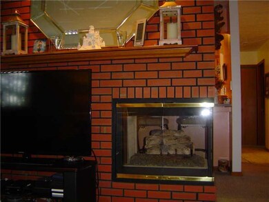 Living Room. See thru gas fireplace