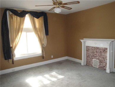 Living Room. Large picture window overlooks front 