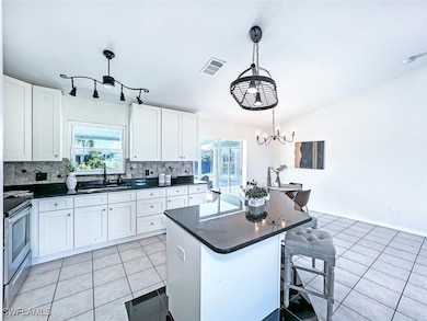 Center island with inviting breakfast bar