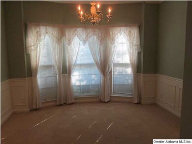 Formal dining room.  Large enough for family celeb