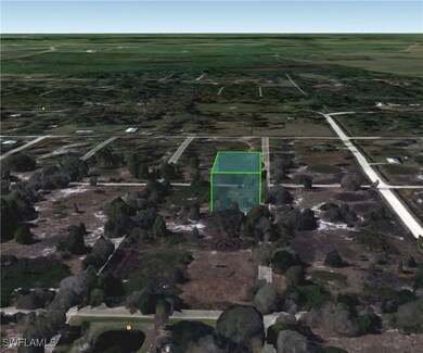 Birds eye view of property featuring a rural view