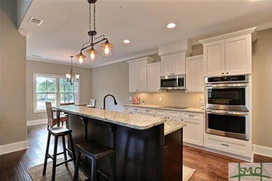Gourmet Kitchen ~ Granite ~ Stainless Appliances ~ Double Ovens ~ Built in Microwave ~ Stove Top ~ Tons of Cabinets ~ Even a Butler's Pantry & Mud Room