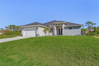 Prairie-style house with a front lawn, concrete dr