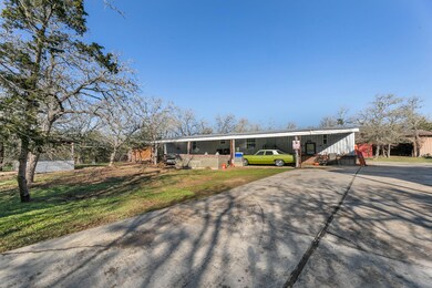 View of front of property featuring a front yard 