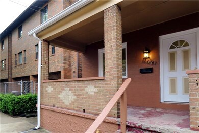 Large front covered front porch.  University shutt