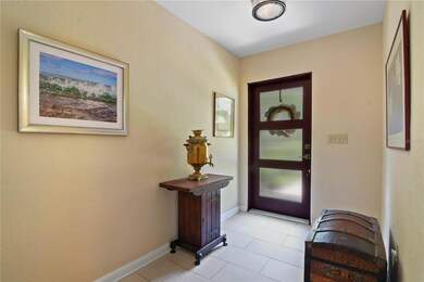 Before heading out back to check out your unobstructed lake views and private dock, tour this beautiful ranch style home that has been expertly restored while honoring the classic mid-century feel!