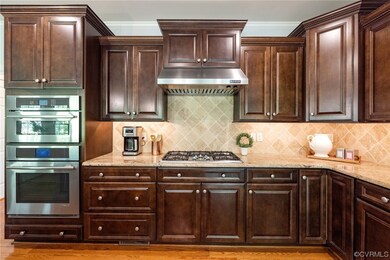 Kitchen, open to the family room, features UPGRADE
