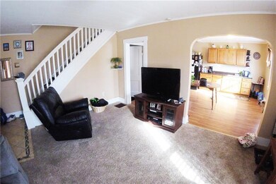 Notice the arched entryway into the dining room - 