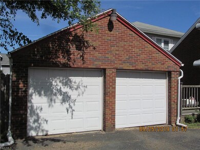 View of garage with electric and opener
