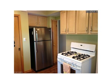 Appliances stay, pantry next to refrigerator.