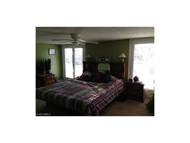 Master bedroom with walk out deck