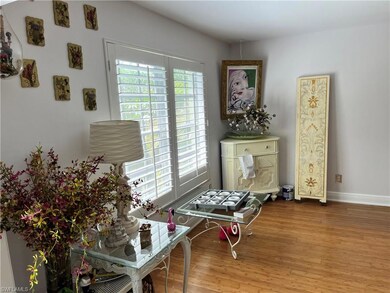 Well lit far side of living room family room - gre
