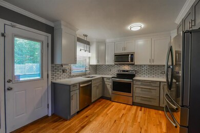54 Saint Laurent St, Epping, NH 03042 - photo 3