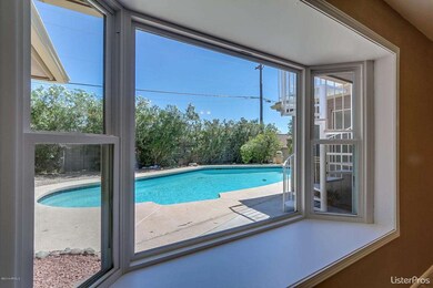 Bay window overlooking pool