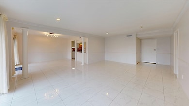 Another view of the  living area features glossy w