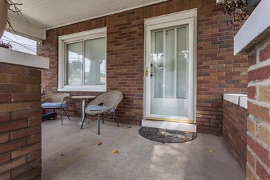 The inviting covered front porch welcomes you to t
