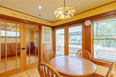 Breakfast nook looking into formal dining room or