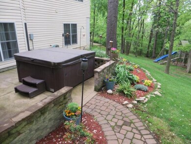 Lower level patio w-hot tub