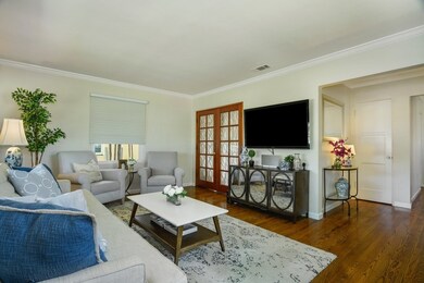 The French doors lead to one of the bedrooms....ma