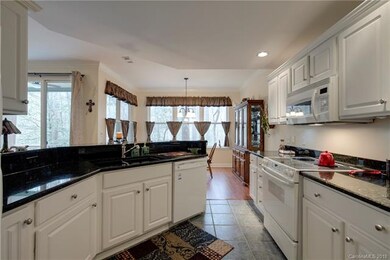 Lovely Kitchen with lots of cabinetry