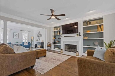 Inviting and beautifully styled living room featur