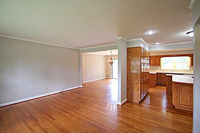 View from family room to kitchen and dining room