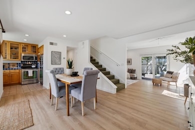 Wonderful open floor plan for ease of entertaining and all day light.  Windows on 3 sides, bringing nature inside.