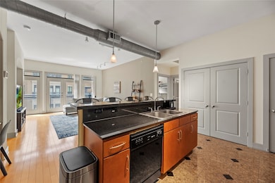 This stunning 2-bedroom, 2-bathroom condo offers unparalleled convenience and luxury, overlooking a sparkling resort-style pool.