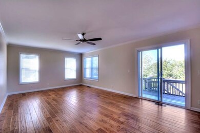 Spacious Great Room looking at marsh and natural a